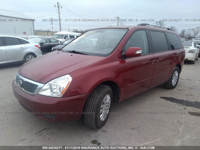 KNDMG4C77C6499409 - 2012 KIA SEDONA LX RED photo 2