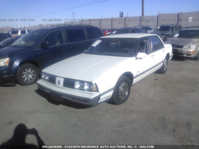 1G3HN54C5KH309795 - 1989 OLDSMOBILE DELTA 88 ROYALE WHITE photo 6