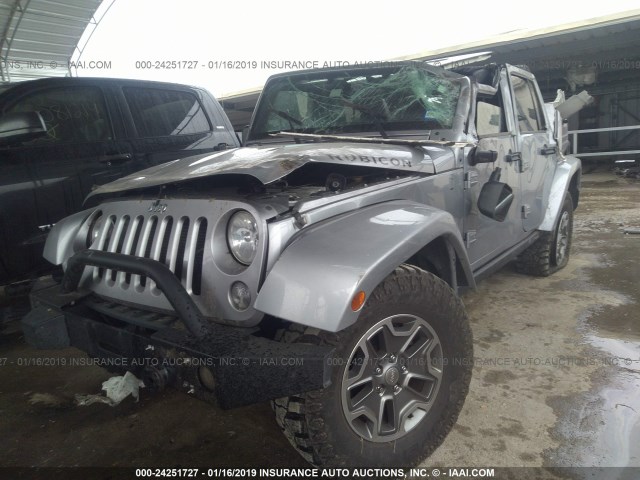 1C4BJWFGXEL135148 - 2014 JEEP WRANGLER UNLIMITE RUBICON SILVER photo 2