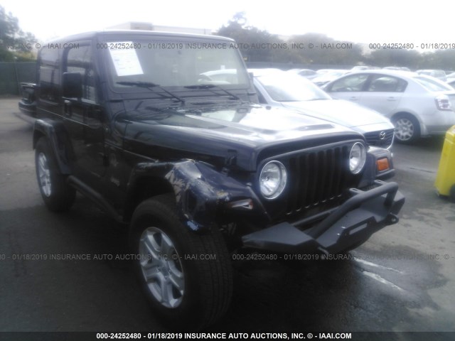 1J4FA59S3YP722116 - 2000 JEEP WRANGLER / TJ SAHARA BLACK photo 1