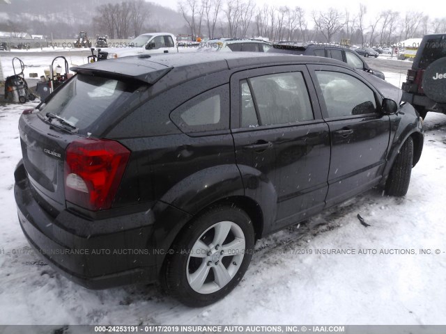 1B3CB3HA3BD106574 - 2011 DODGE CALIBER MAINSTREET BLACK photo 4