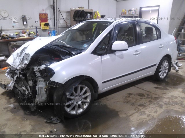 JS2YC5A28B6301466 - 2011 SUZUKI SX4 LE WHITE photo 2