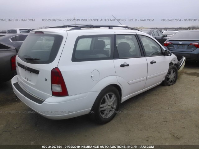 1FAFP36P5YW296143 - 2000 FORD FOCUS SE/SE COMFORT WHITE photo 4