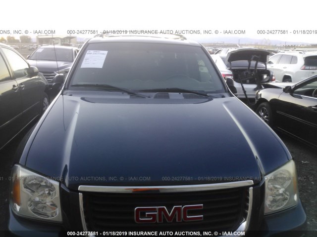 1GKDS13SX42424380 - 2004 GMC ENVOY BLUE photo 6