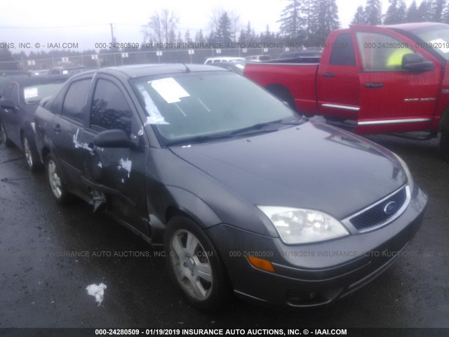 1FAFP34N15W301884 - 2005 FORD FOCUS ZX4 GRAY photo 1