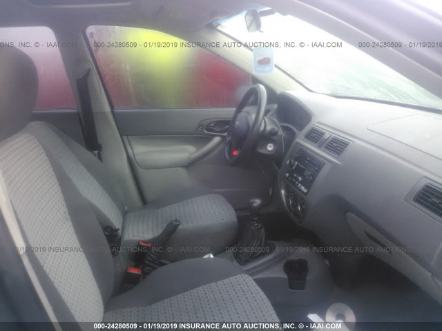 1FAFP34N15W301884 - 2005 FORD FOCUS ZX4 GRAY photo 5