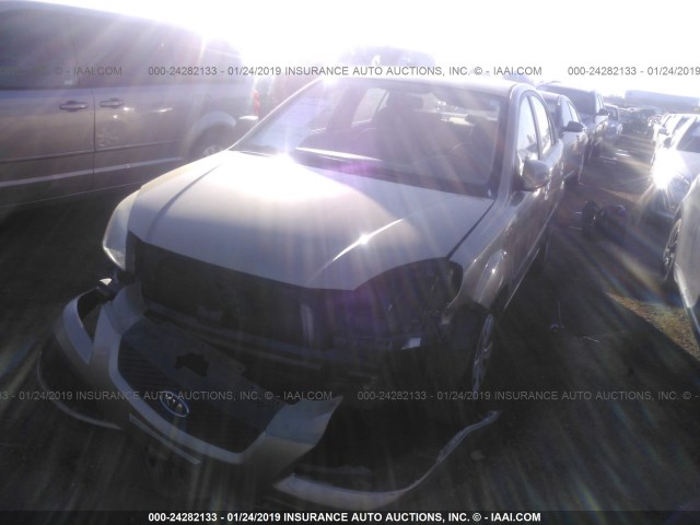 KNADE223496524510 - 2009 KIA RIO LX/SX GOLD photo 2