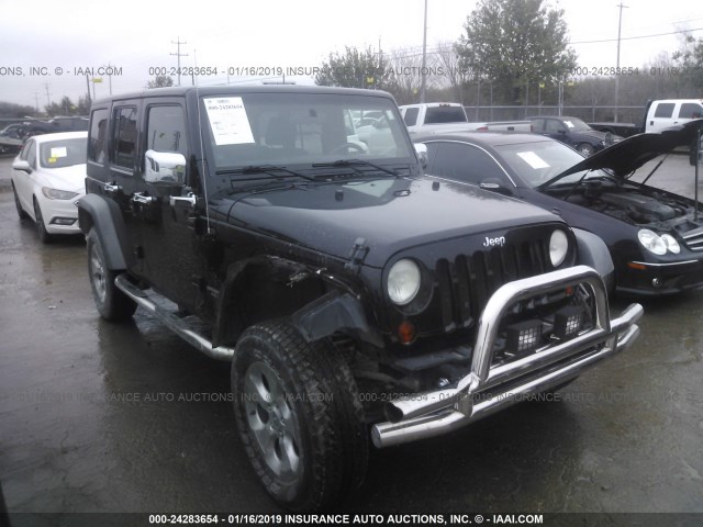 1J4HA6H13BL520320 - 2011 JEEP WRANGLER UNLIMITE RUBICON BLACK photo 1