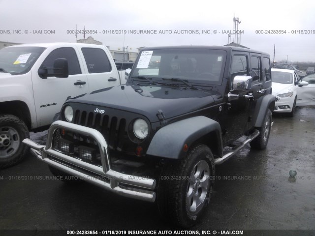 1J4HA6H13BL520320 - 2011 JEEP WRANGLER UNLIMITE RUBICON BLACK photo 2