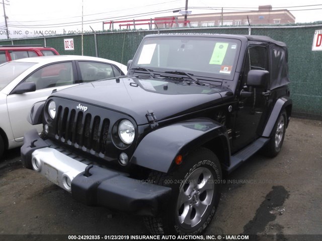 1C4AJWBG7EL109821 - 2014 JEEP WRANGLER SAHARA BLACK photo 2