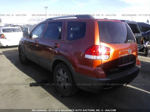 KNDJJ742395020930 - 2009 KIA BORREGO LX/EX ORANGE photo 3