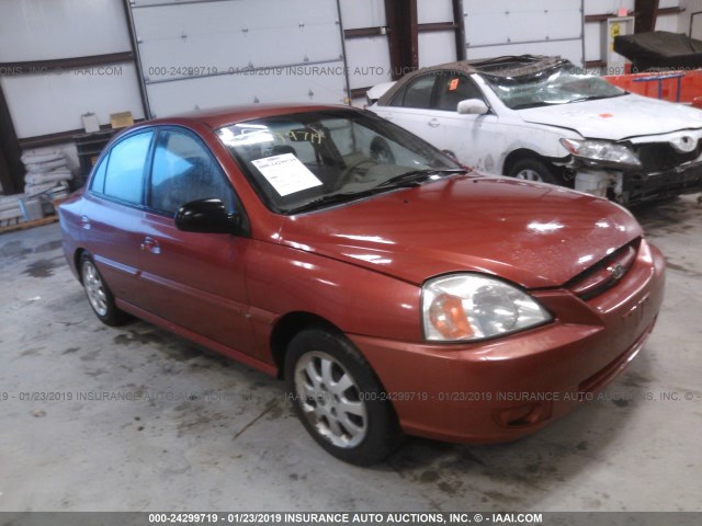 KNADC125546342406 - 2004 KIA RIO ORANGE photo 1