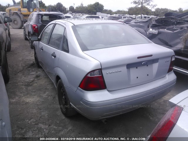 1FAFP34N95W250604 - 2005 FORD FOCUS ZX4 GRAY photo 3