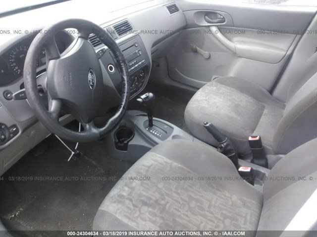 1FAFP34N95W250604 - 2005 FORD FOCUS ZX4 GRAY photo 5