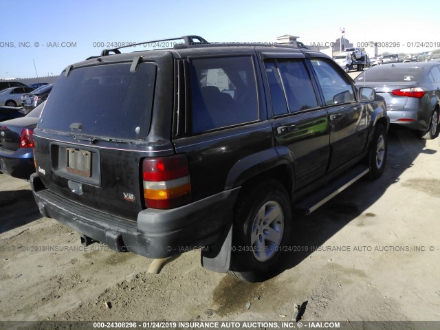 1J4GX58YXVC539713 - 1997 JEEP GRAND CHEROKEE LAREDO/TSI BLACK photo 4