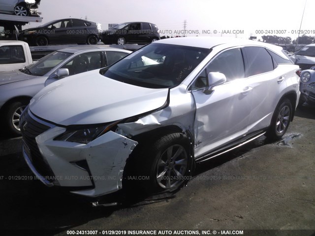 2T2ZZMCA1JC101205 - 2018 LEXUS RX 350/BASE/F SPORT WHITE photo 2