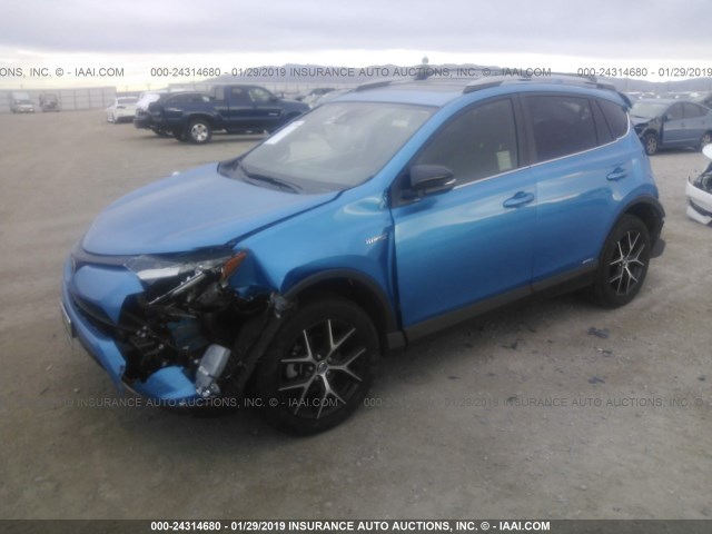 JTMJJREV1HD100350 - 2017 TOYOTA RAV4 HV SE BLUE photo 2