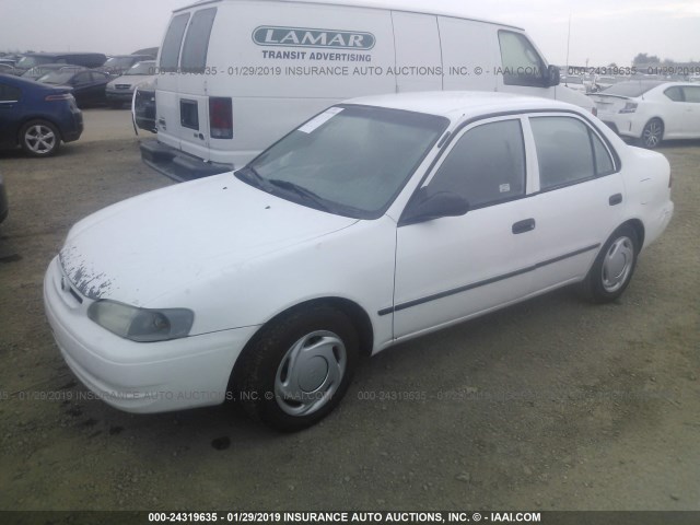 1NXBR12E7XZ211675 - 1999 TOYOTA COROLLA VE/CE/LE WHITE photo 2