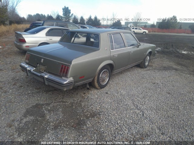 1G3AM69A5DM519857 - 1983 OLDSMOBILE CUTLASS SUPREME BROUGHAM GREEN photo 4