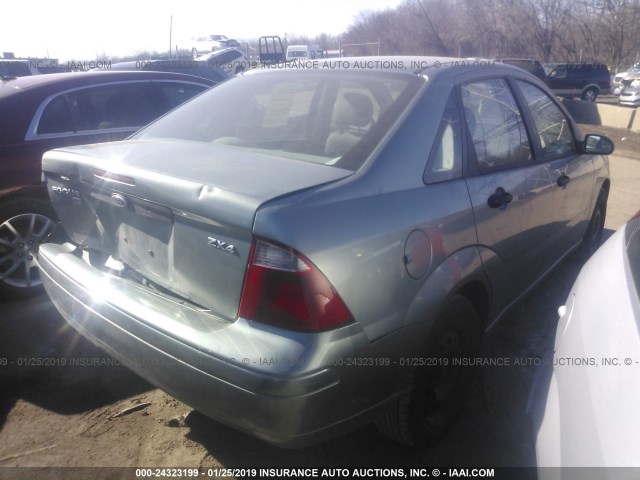 1FAFP34N85W307178 - 2005 FORD FOCUS ZX4 Light Blue photo 4