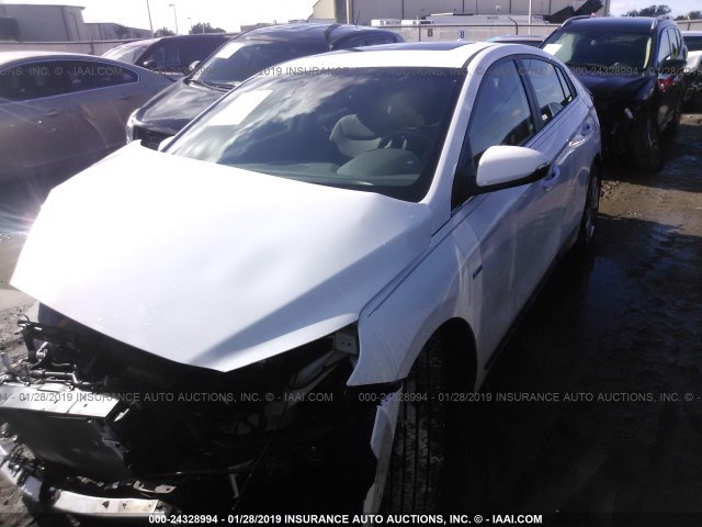 KMHC05LC0HU035587 - 2017 HYUNDAI IONIQ HEV WHITE photo 2