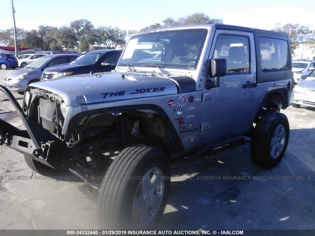 1C4AJWAGXFL638568 - 2015 JEEP WRANGLER SPORT SILVER photo 2