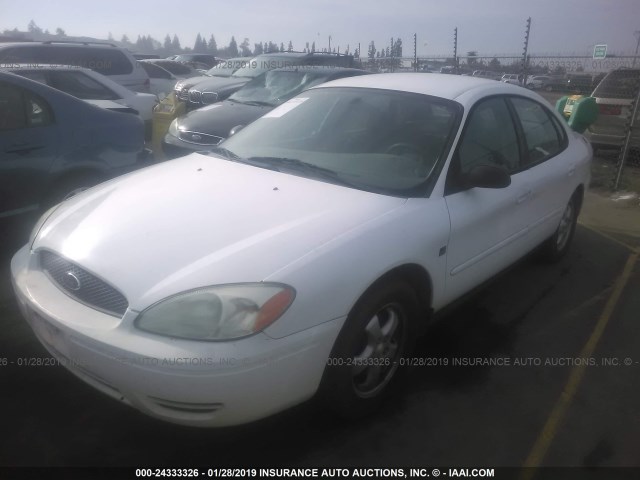 1FAFP55S84A182856 - 2004 FORD TAURUS SES WHITE photo 2