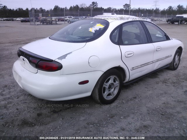 1FAFP53U2XA262839 - 1999 FORD TAURUS SE WHITE photo 4