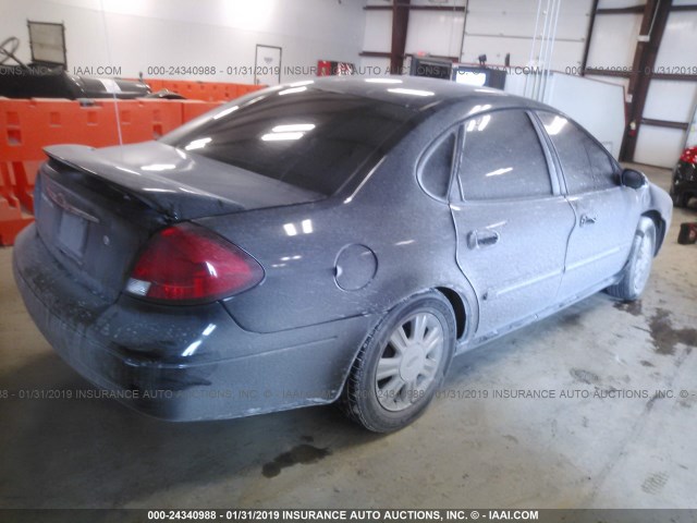 1FAHP56S43G129266 - 2003 FORD TAURUS SEL BLACK photo 4