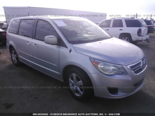 2V8HW34109R554006 - 2009 VOLKSWAGEN ROUTAN SE SILVER photo 1