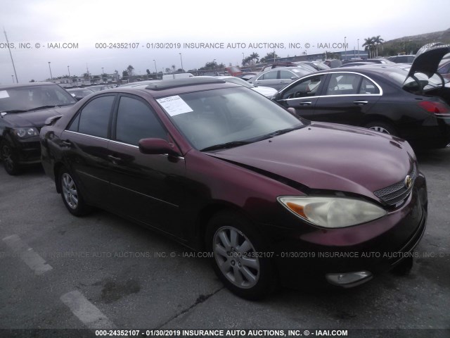 JTDBF30K020013568 - 2002 TOYOTA CAMRY LE/XLE/SE RED photo 1