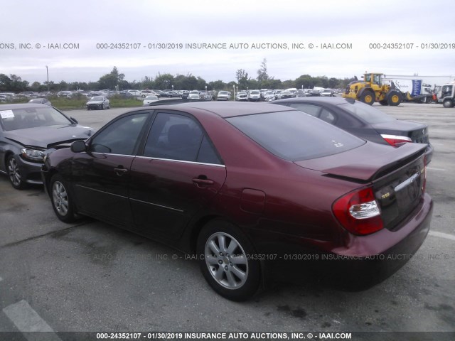 JTDBF30K020013568 - 2002 TOYOTA CAMRY LE/XLE/SE RED photo 3