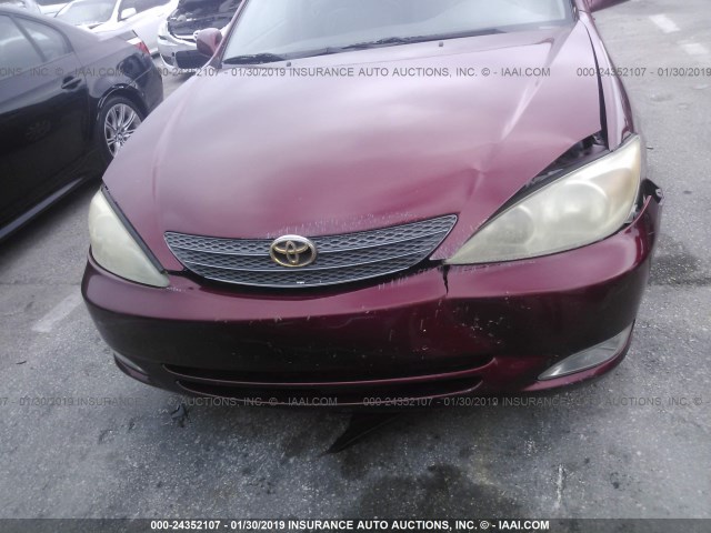 JTDBF30K020013568 - 2002 TOYOTA CAMRY LE/XLE/SE RED photo 6