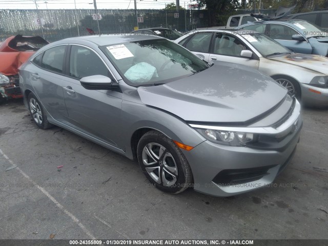 2HGFC2F59JH562381 - 2018 HONDA CIVIC LX Boz foto 1