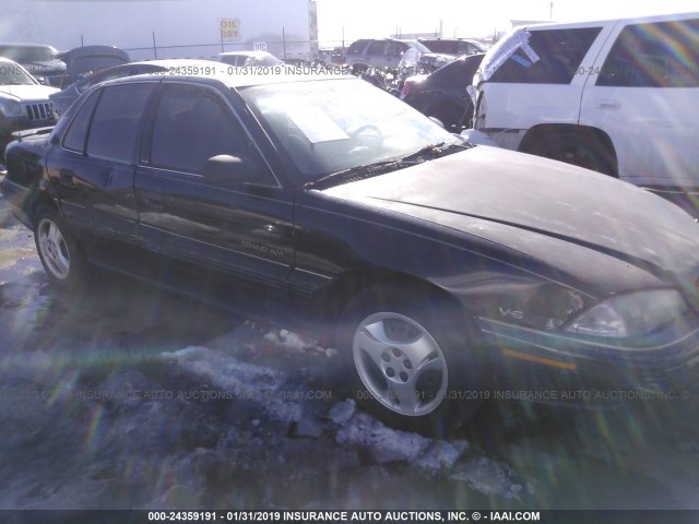 1G2NE55MXRC763160 - 1994 PONTIAC GRAND AM SE BLACK photo 1