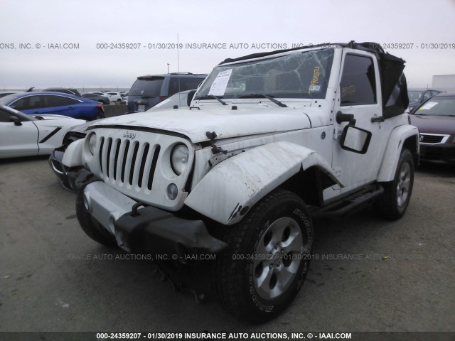 1C4AJWBG2EL124940 - 2014 JEEP WRANGLER SAHARA WHITE photo 2