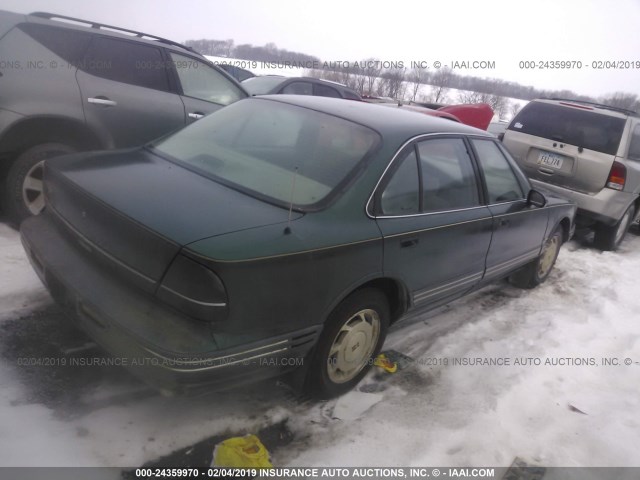 1G3HN52K3S4828958 - 1995 OLDSMOBILE 88 ROYALE GREEN photo 4