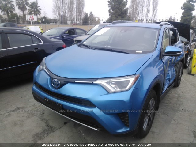 JTMRJREV6JD207189 - 2018 TOYOTA RAV4 HV LE PLUS/XLE BLUE photo 2