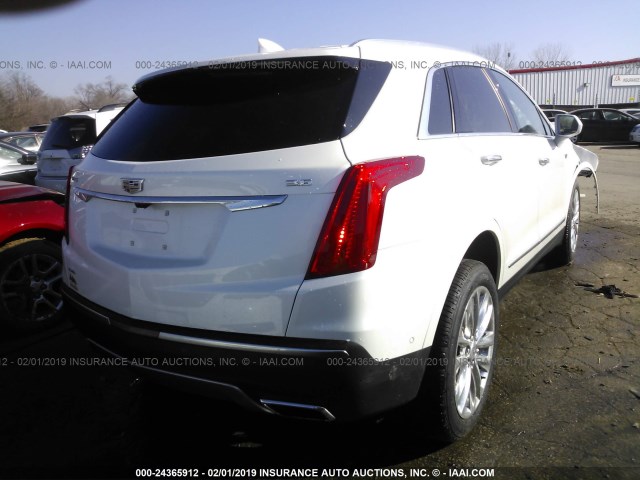 1GYKNGRS8JZ158861 - 2018 CADILLAC XT5 PLATINUM WHITE photo 4