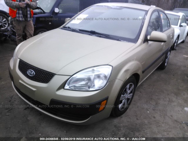 KNADE223796440732 - 2009 KIA RIO LX/SX GOLD photo 2