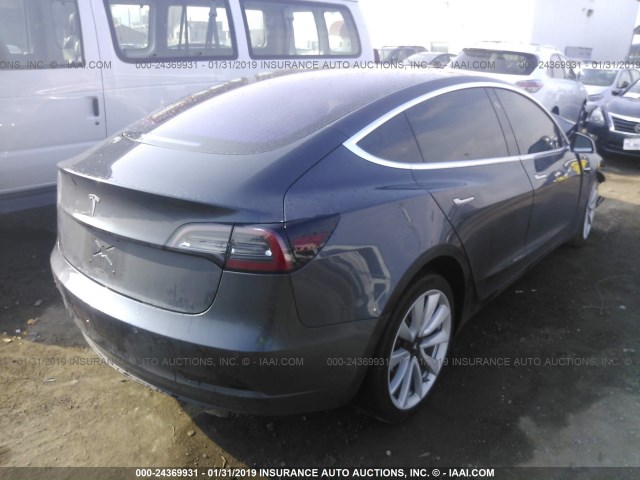 5YJ3E1EA1HF001712 - 2017 TESLA MODEL 3 GRAY photo 4