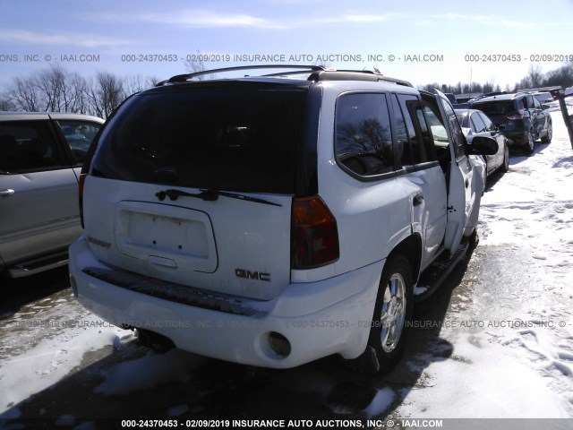 1GKDT13S552316876 - 2005 GMC ENVOY WHITE photo 4