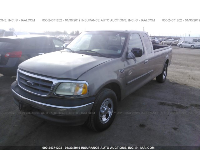 1FTRX17L52NA48950 - 2002 FORD F150 TAN photo 2