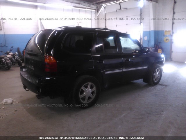 1GKDT13S872112236 - 2007 GMC ENVOY BLACK photo 4