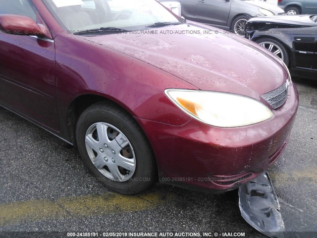 JTDBE32K330141062 - 2003 TOYOTA CAMRY LE/XLE RED photo 6