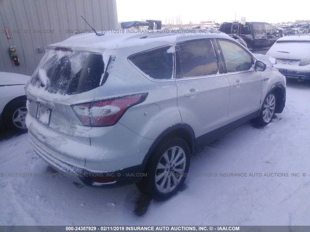 1FMCU0J95HUC28980 - 2017 FORD ESCAPE TITANIUM SILVER photo 4