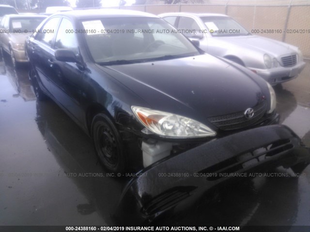 4T1BE30KX2U577087 - 2002 TOYOTA CAMRY LE/XLE/SE BLACK photo 1