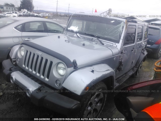 1C4BJWEG5GL347525 - 2016 JEEP WRANGLER UNLIMITE SAHARA GRAY photo 2