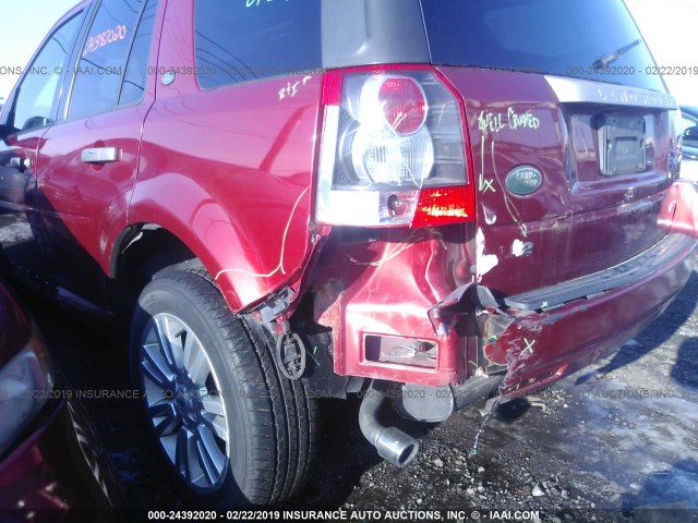 SALFR24N89H118368 - 2009 LAND ROVER LR2 HSE RED photo 6