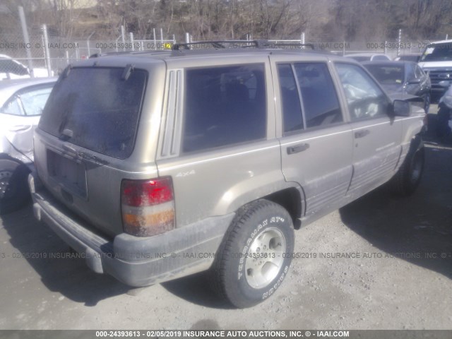 1J4GZ58S5VC588582 - 1997 JEEP GRAND CHEROKEE LAREDO/TSI GRAY photo 4